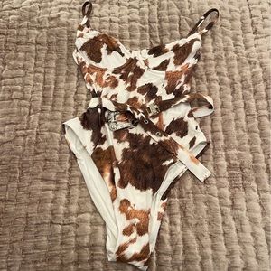 We wore what cow print one piece